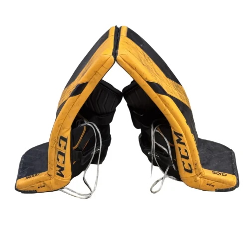 CCM AXIS - Used Pro Stock Goalie Pad Set (Black/Yellow) 17 CCM AXIS - Used Pro Stock Goalie Pad Set (Black/Yellow) -Hockey Stick Market Image 20250317 164454 700 transparent Craiyon
