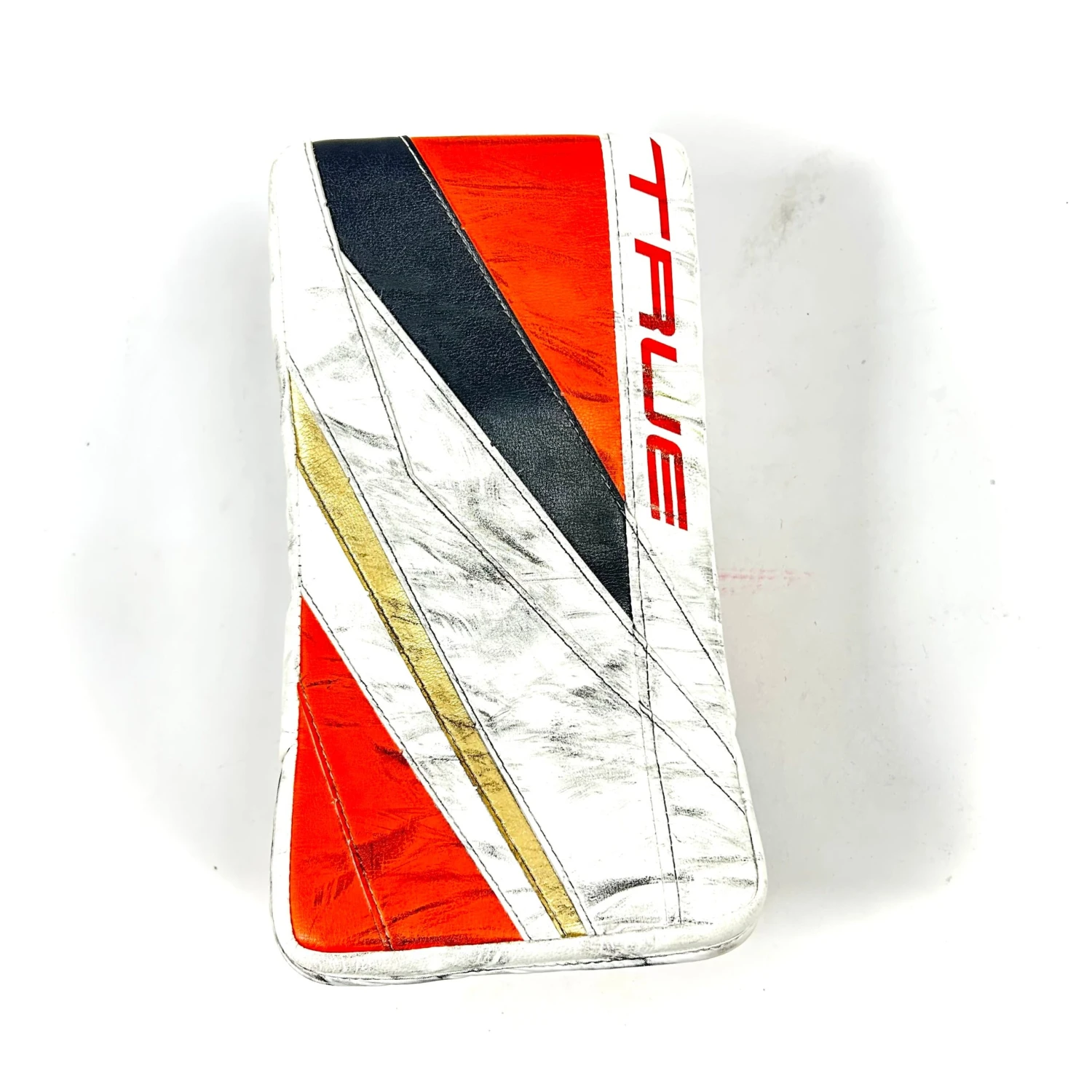 True L20.2 - Used Pro Stock Goalie Blocker (White/Black/Orange) 1 True L20.2 - Used Pro Stock Goalie Blocker (White/Black/Orange)