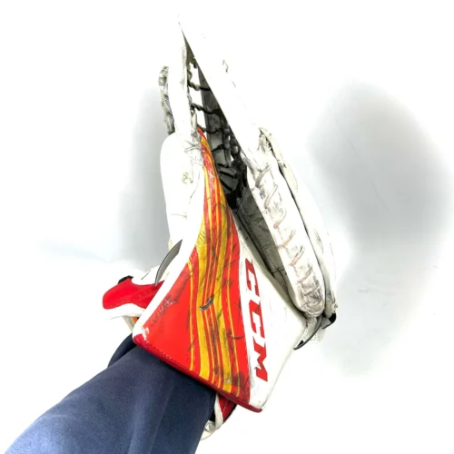 CCM Extreme Flex 5 - Used CHL Pro Stock Goalie Glove (White/Red/Yellow) - V2 5 CCM Extreme Flex 5 - Used CHL Pro Stock Goalie Glove (White/Red/Yellow) - V2 -Hockey Stick Market Photo2024 05 08 21928PM scaled