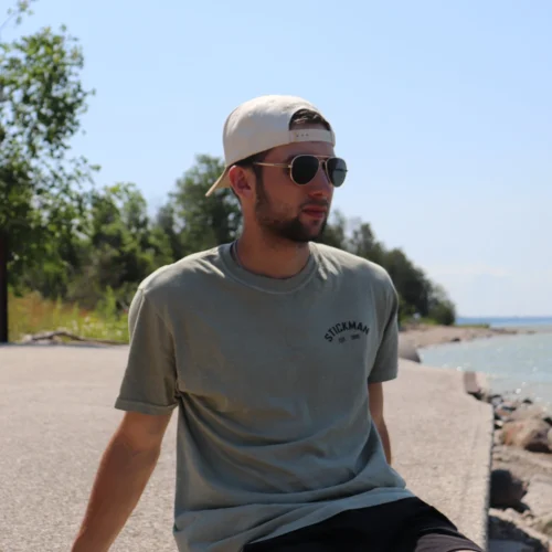 HSM StickMan Tee -Hockey Stick Market beached