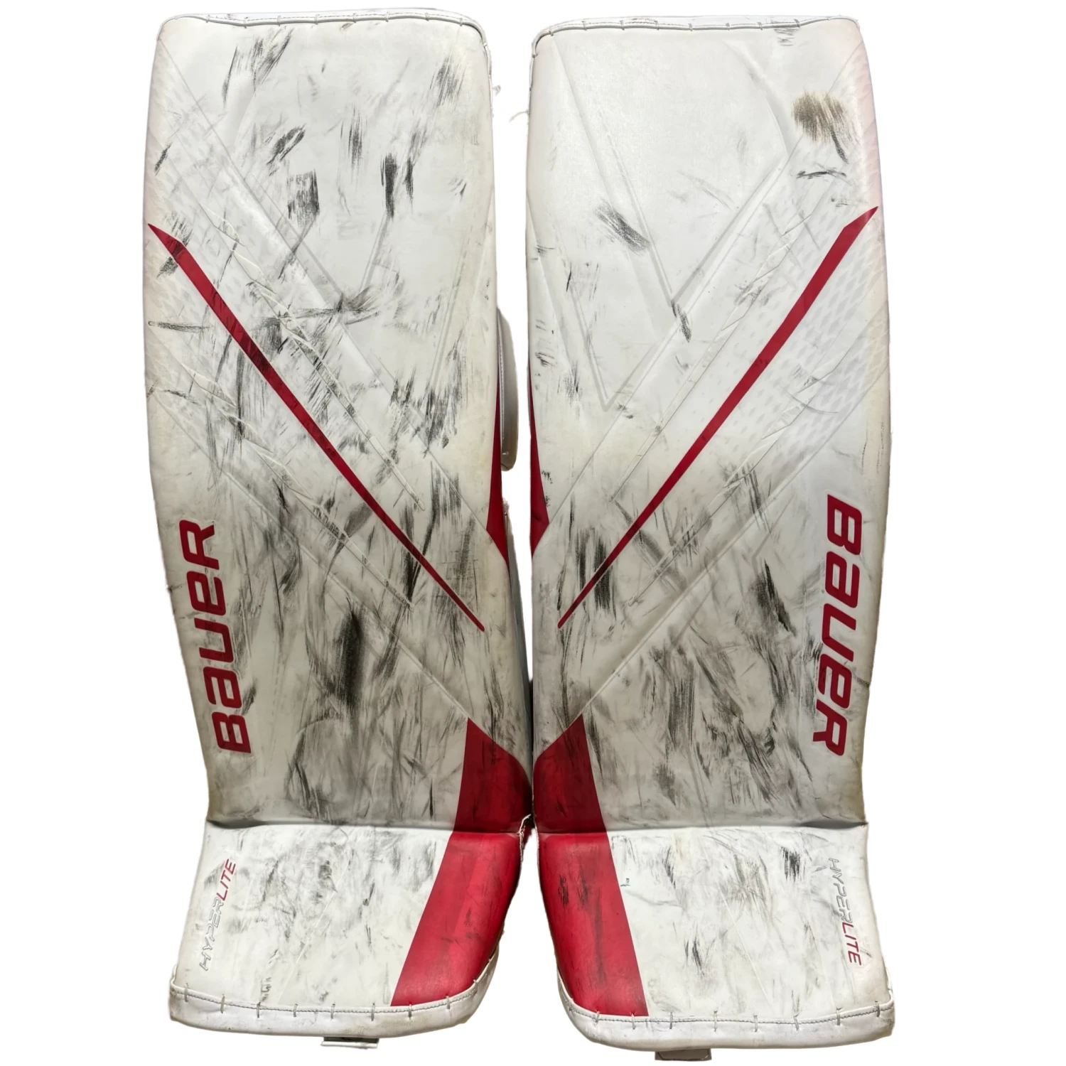 Used - Bauer Vapor Hyperlite Pro Stock Goalie Pads (White/Red) 1 Used - Bauer Vapor Hyperlite Pro Stock Goalie Pads (White/Red)