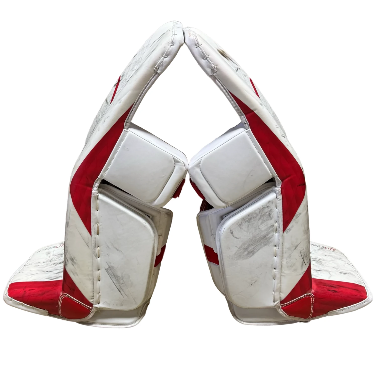 Used - Bauer Vapor Hyperlite Pro Stock Goalie Pads (White/Red) 3 Used - Bauer Vapor Hyperlite Pro Stock Goalie Pads (White/Red) - Image 3