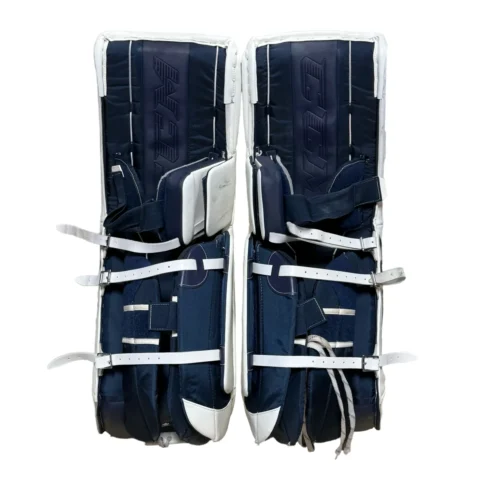 CCM Extreme Flex 5 - Used NCAA Pro Stock Goalie Pads (White/Navy/Gold) 5 CCM Extreme Flex 5 - Used NCAA Pro Stock Goalie Pads (White/Navy/Gold) -Hockey Stick Market craiyon 103702 image