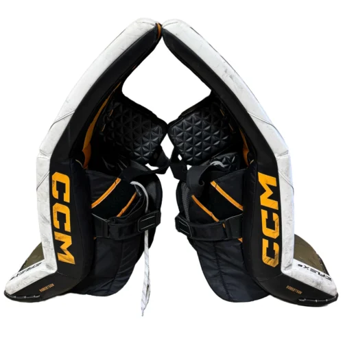 CCM Extreme Flex 6 - Used Pro Stock Goalie Pads (White/Green/Yellow/Black) 6 CCM Extreme Flex 6 - Used Pro Stock Goalie Pads (White/Green/Yellow/Black) -Hockey Stick Market craiyon 121823 image