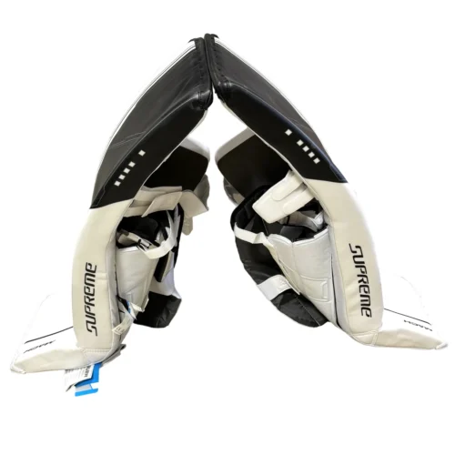 Bauer Supreme Mach - New Pro Stock Goalie Pads (White/Black) 7 Bauer Supreme Mach - New Pro Stock Goalie Pads (White/Black) -Hockey Stick Market craiyon 140804 image